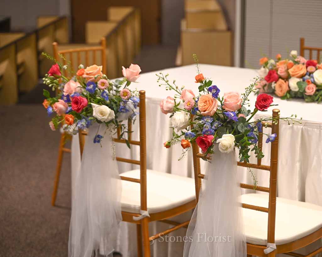 Colourful spring wedding floral at Grace Baptist Church