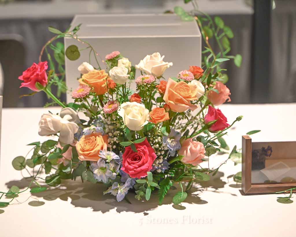 Colourful spring wedding floral at Grace Baptist Church